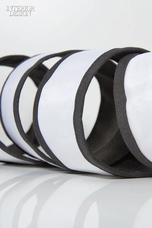 Luminous Tex from Sensing Tex. Composition: plastic. Notes: Optical fibers, threaded through fabric and connected to a light source, can distribute illumination evenly across the entire surface of the textile.