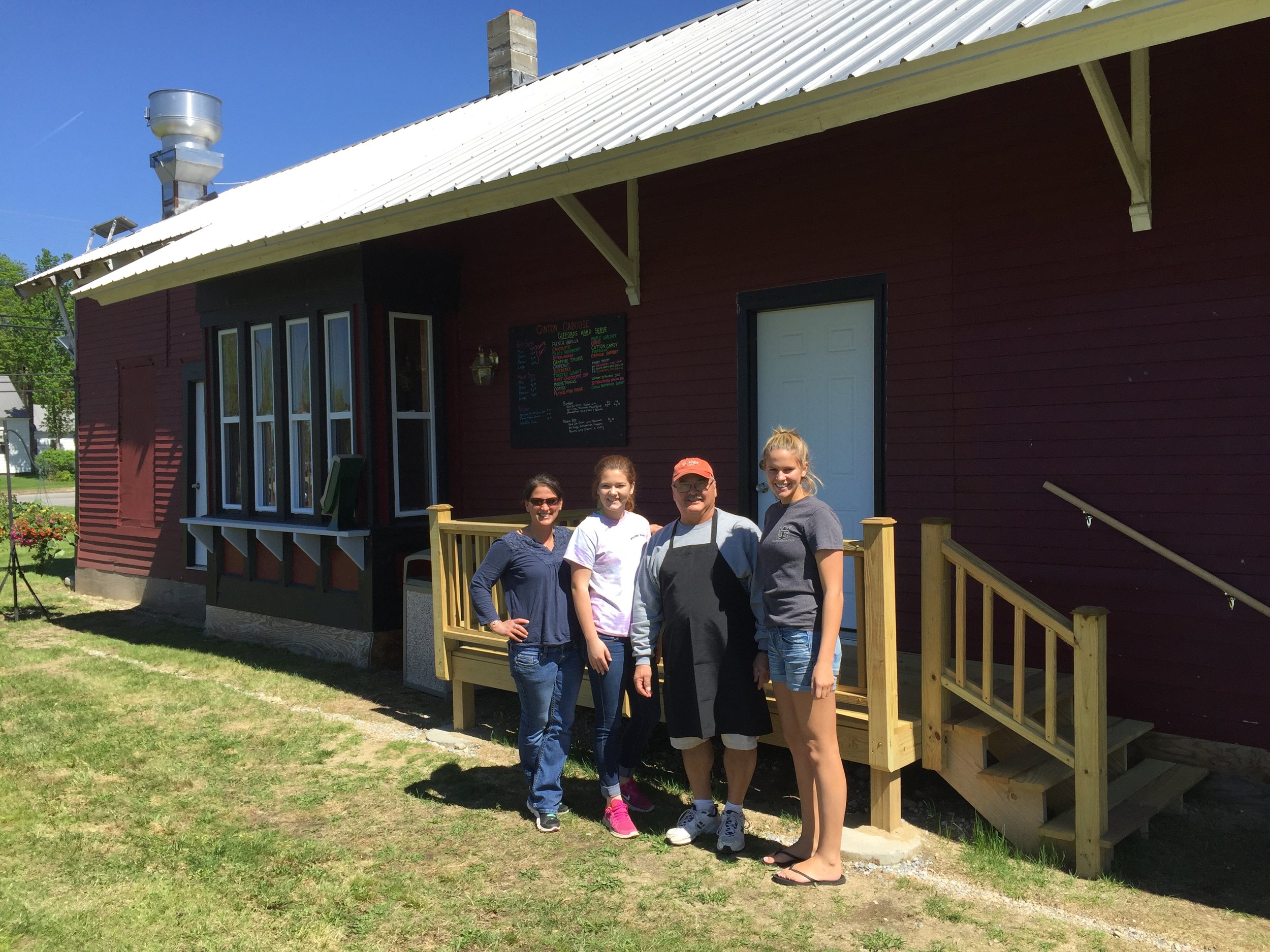 NOW: Canton depot now beautifully renovated to become The Canton Caboose .History and ice cream! (L to R: Emily Bourassa, Owner; Lauren Ferland; John Therrien; and Kaicey Conant.) 2017