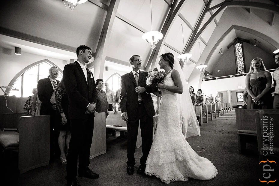 bride and father walking down the aisle