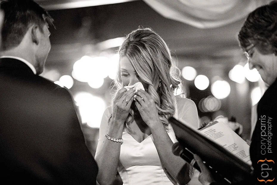 bride crying during wedding ceremony at Lake Union Cafe