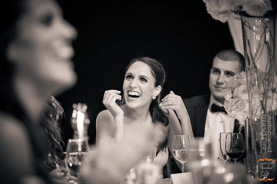 Joy laughing during toasts