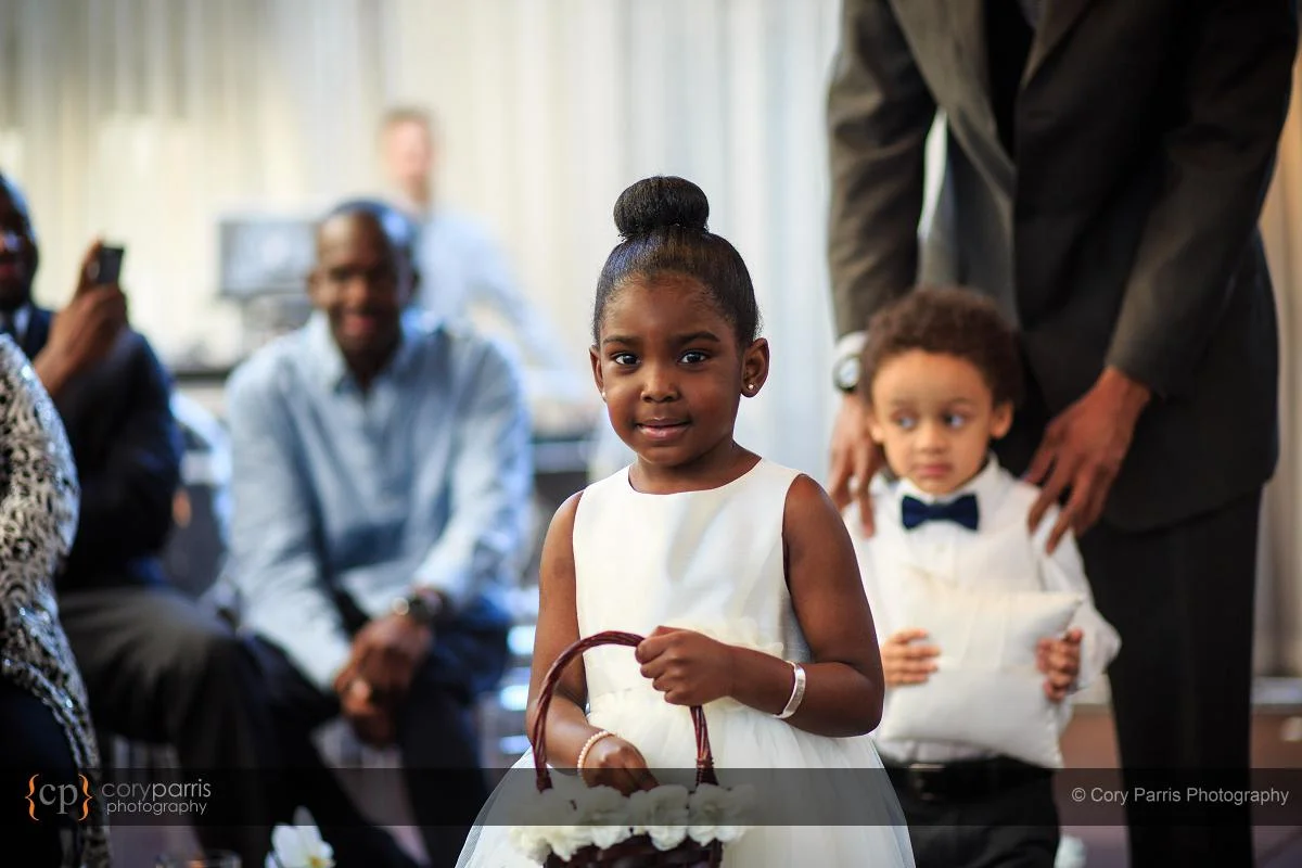 Flower girl walking down the aisle