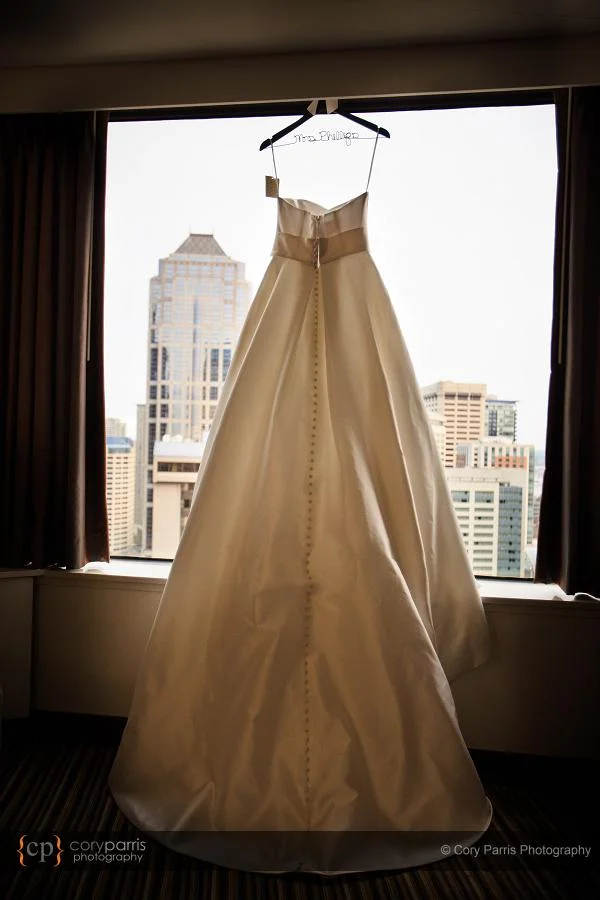 The wedding dress hanging at the hotel
