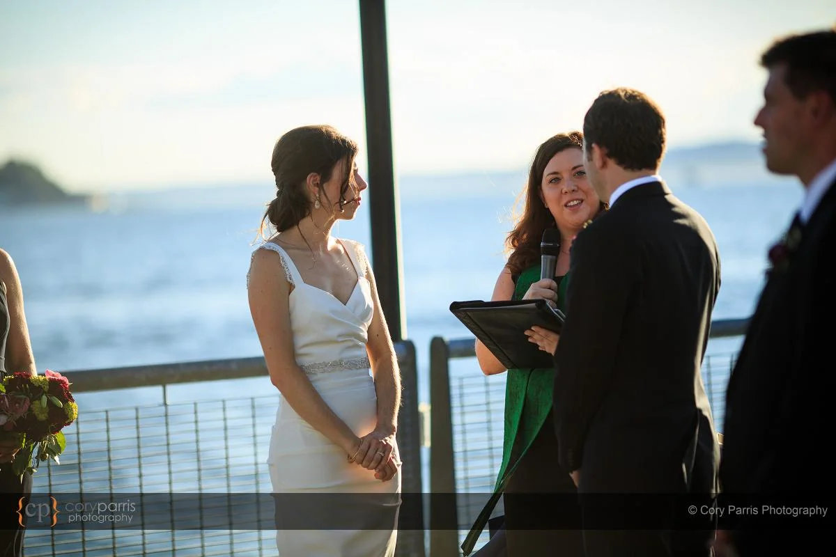 Getting married on the pier behind the Seattle Aquarium.
