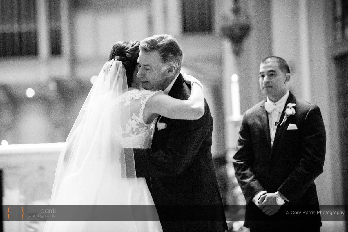 A hug for Dad on the aisle.