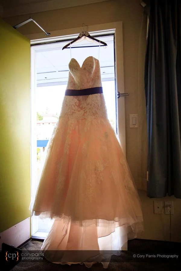 Martina's dress had a pink underliner that showed through when the light was right.
