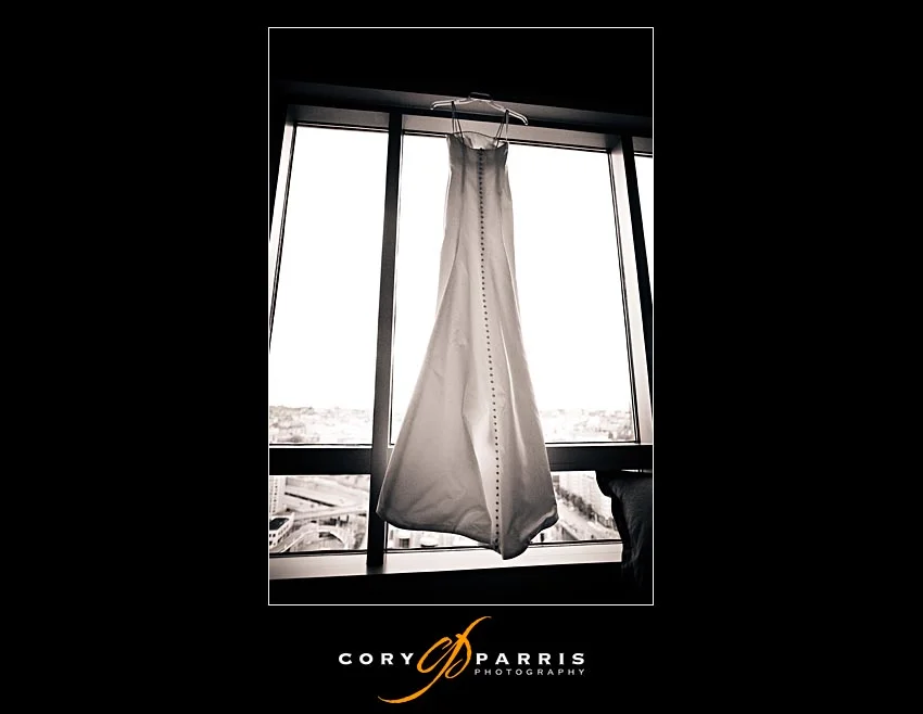 wedding dress hanging in front of seattle