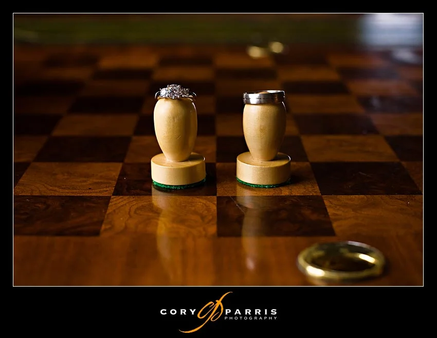 Wedding rings and chess board