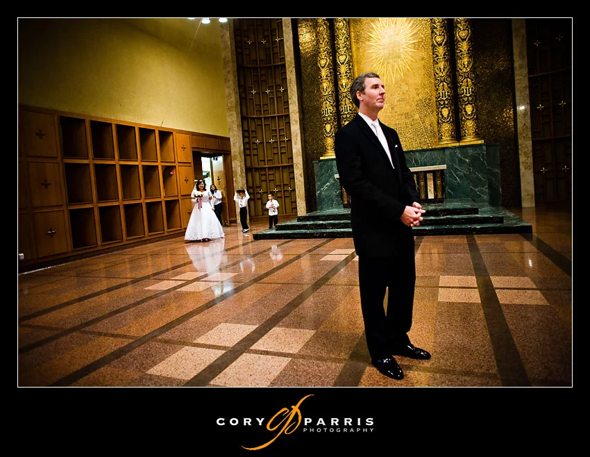 Bride coming up behind groom