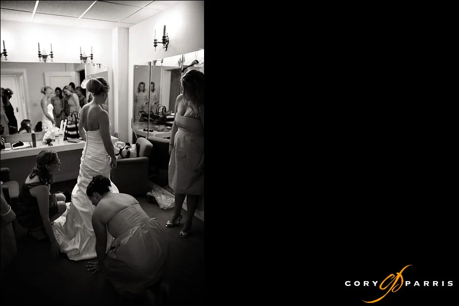 bride getting ready with bridesmaids by seattle wedding photojournalist cory parris