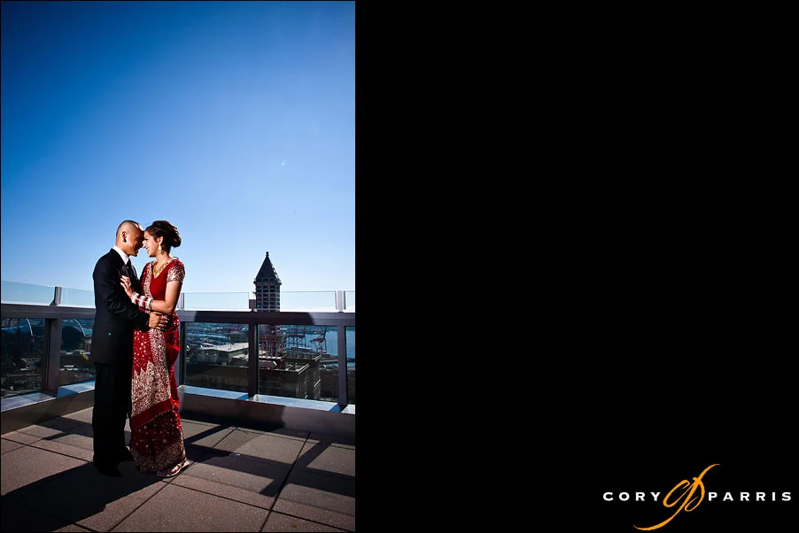 wedding couple on the top of the courthouse by seattle wedding photographer cory parris