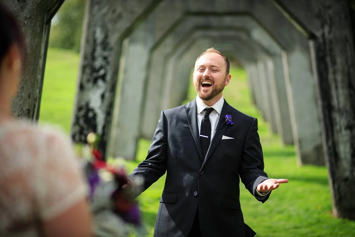Seattle wedding photojournalism joy of the groom during first look at Gas Works Park Wedding