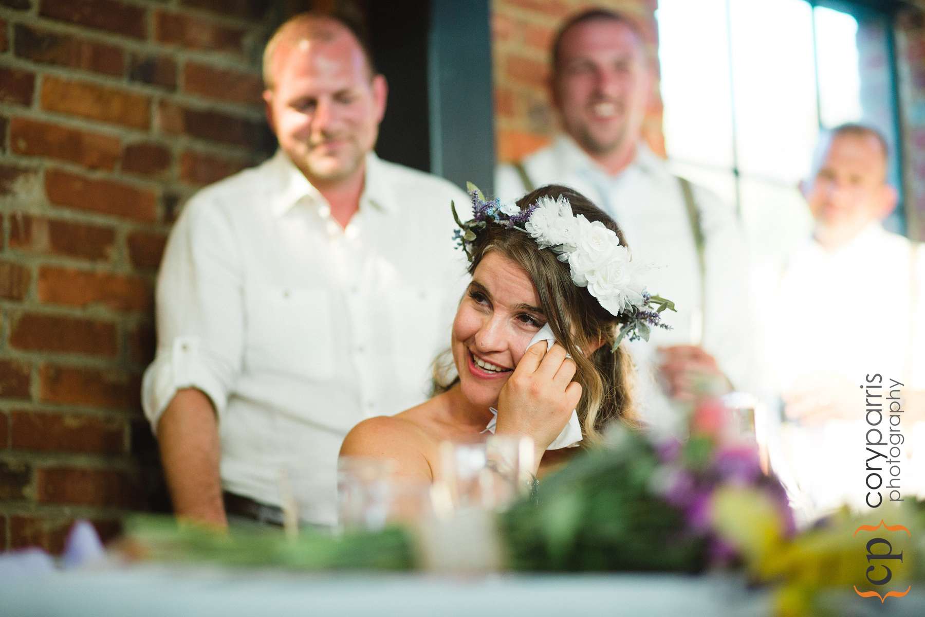 Morada wiping a tear during the toasts
