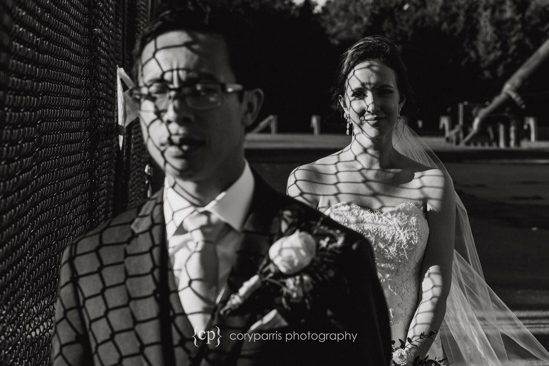  This one was interesting to me. I was playing with the pattern of light through the fence. I like the image, but it is a bit different for a wedding photograph.&nbsp; 
