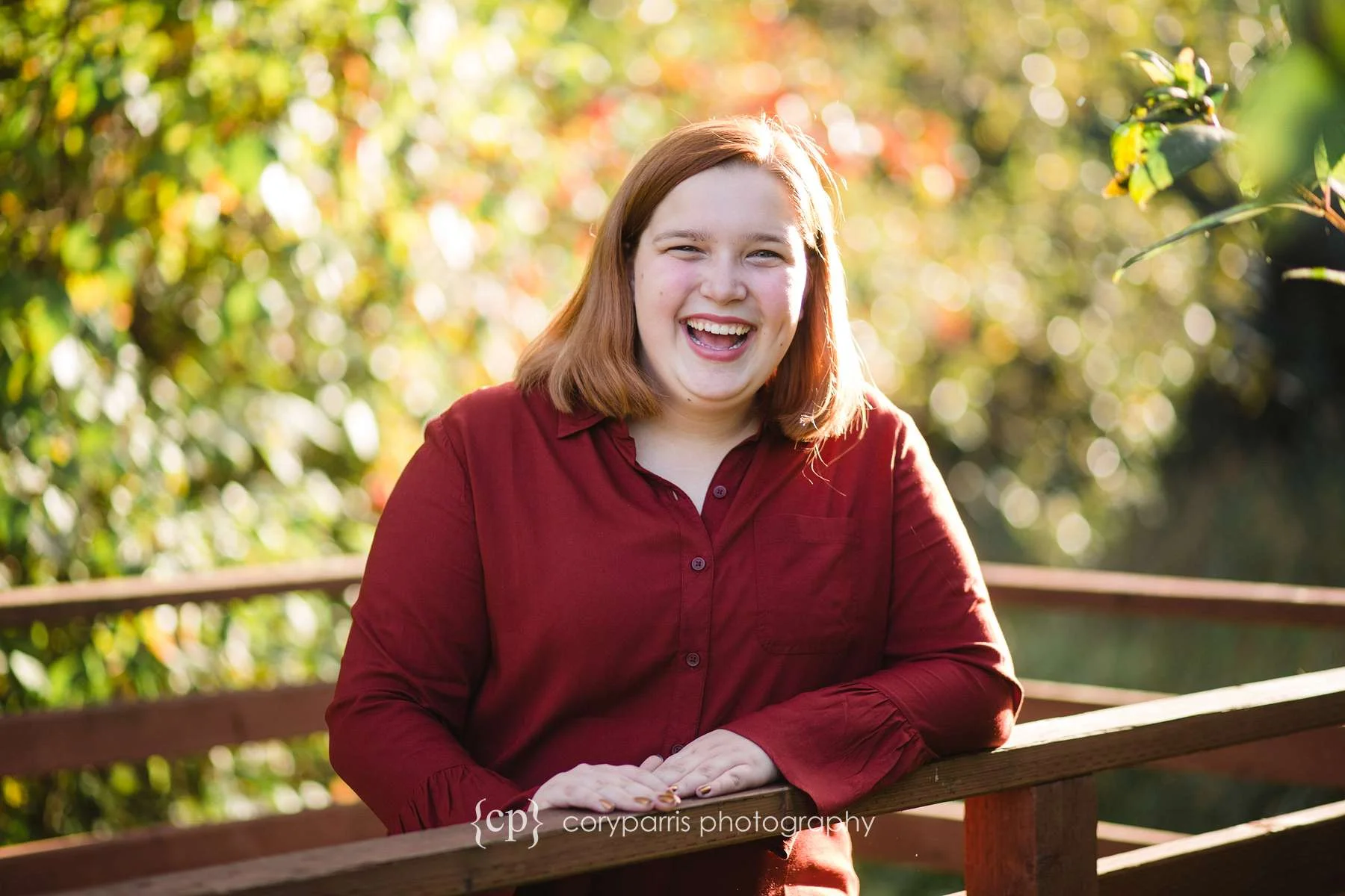 Laughing high school senior portrait photography