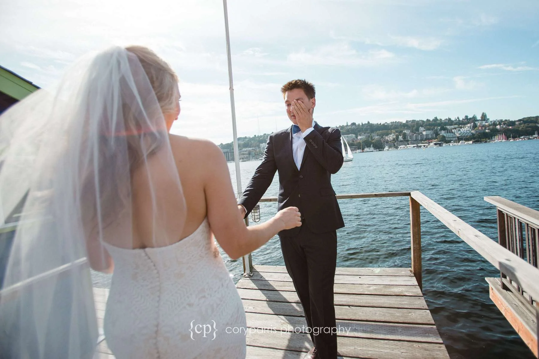 Groom crying as he sees his bride