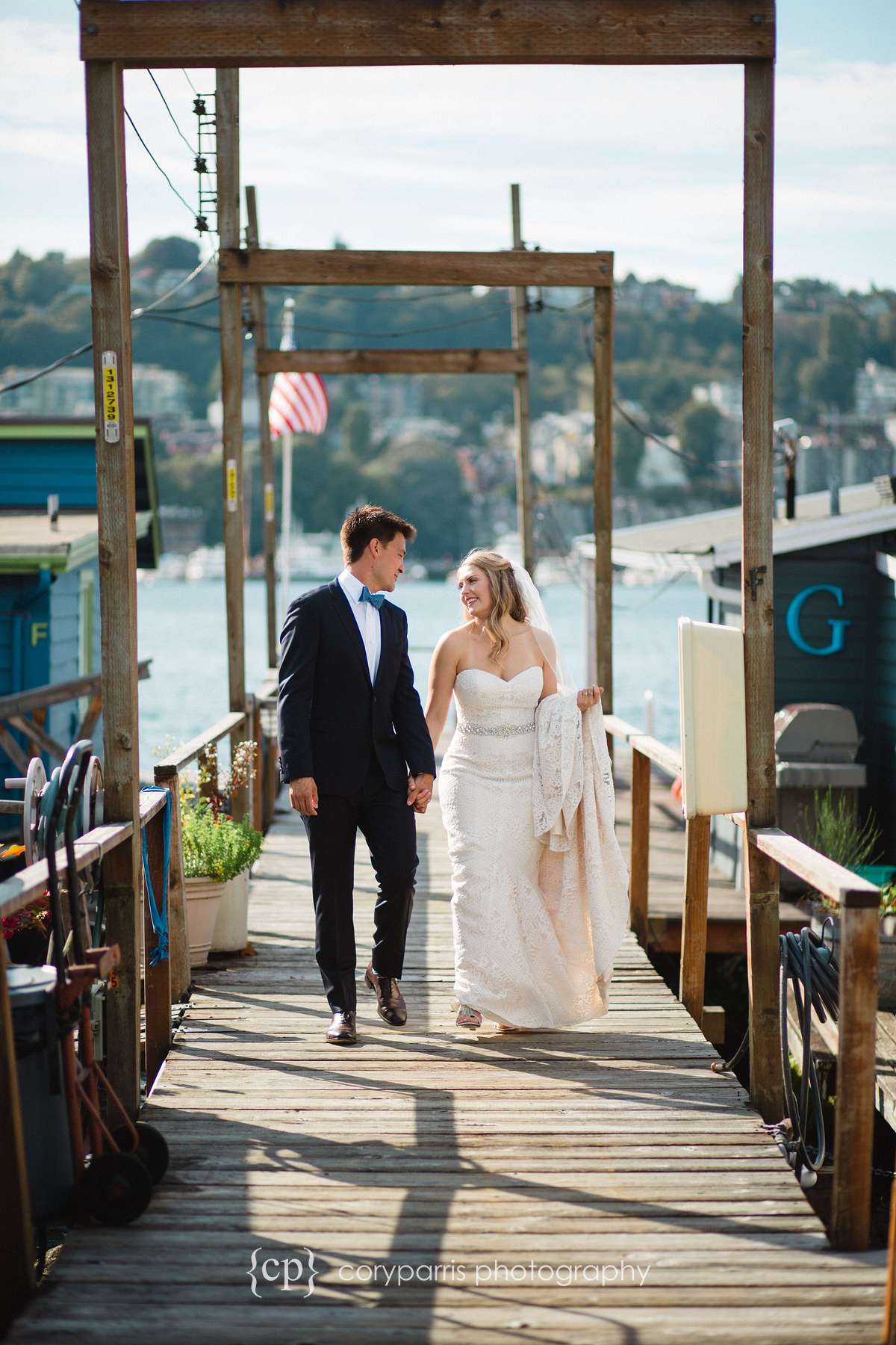 Bride and groom on a dock on Lake Union