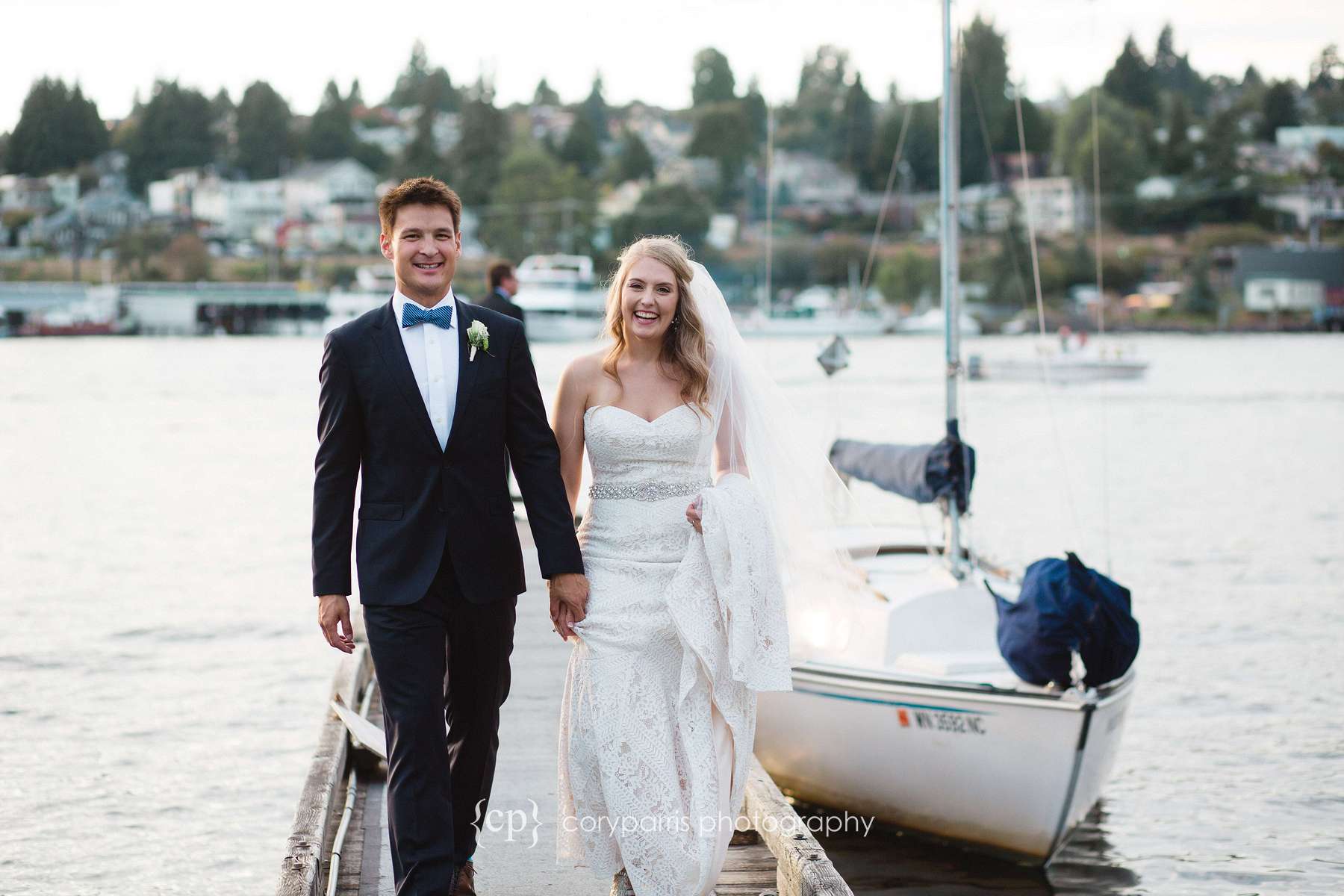 Bride and groom on a dock on Lake Union wedding photographer