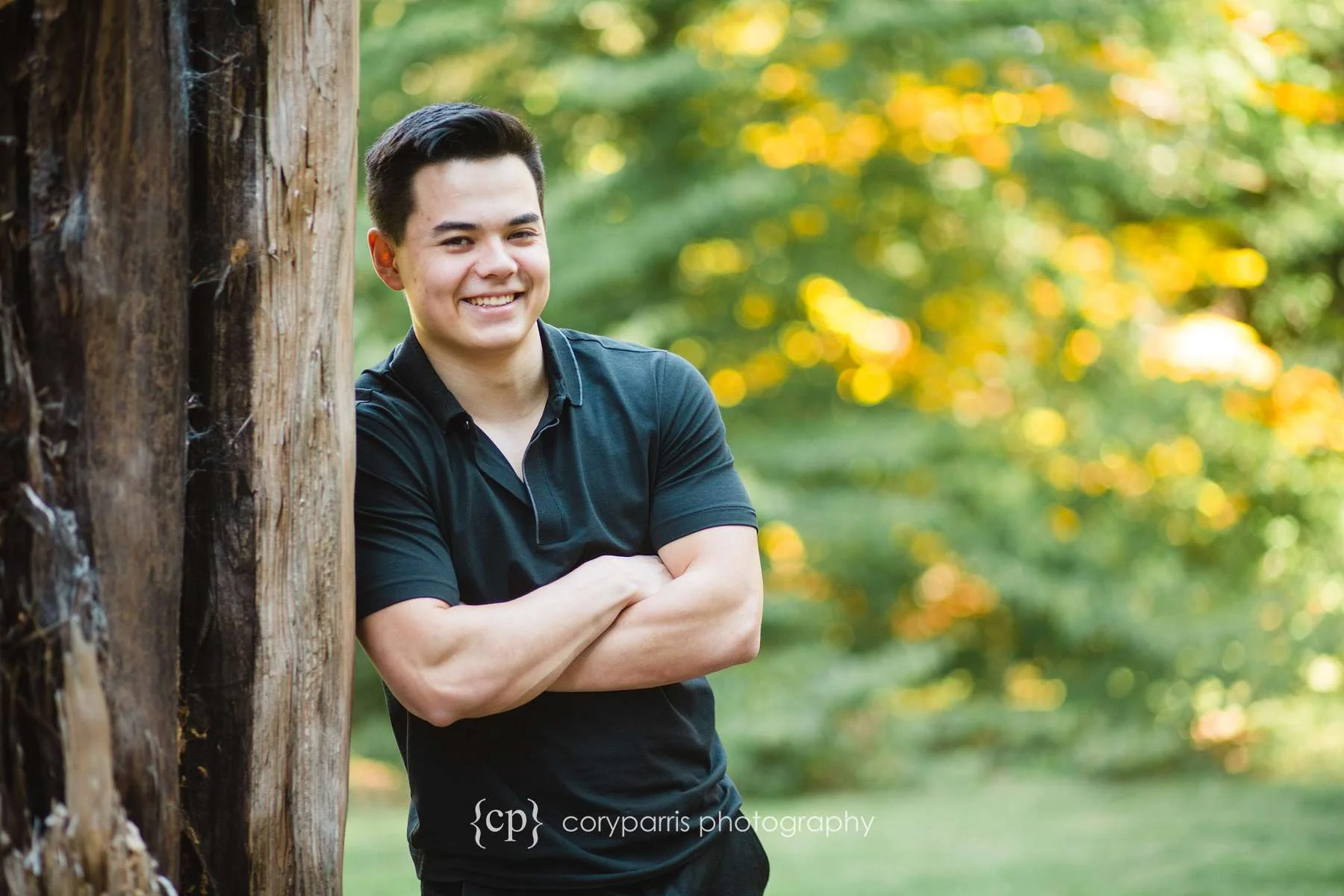 Senior portrait with fall leaves in the background