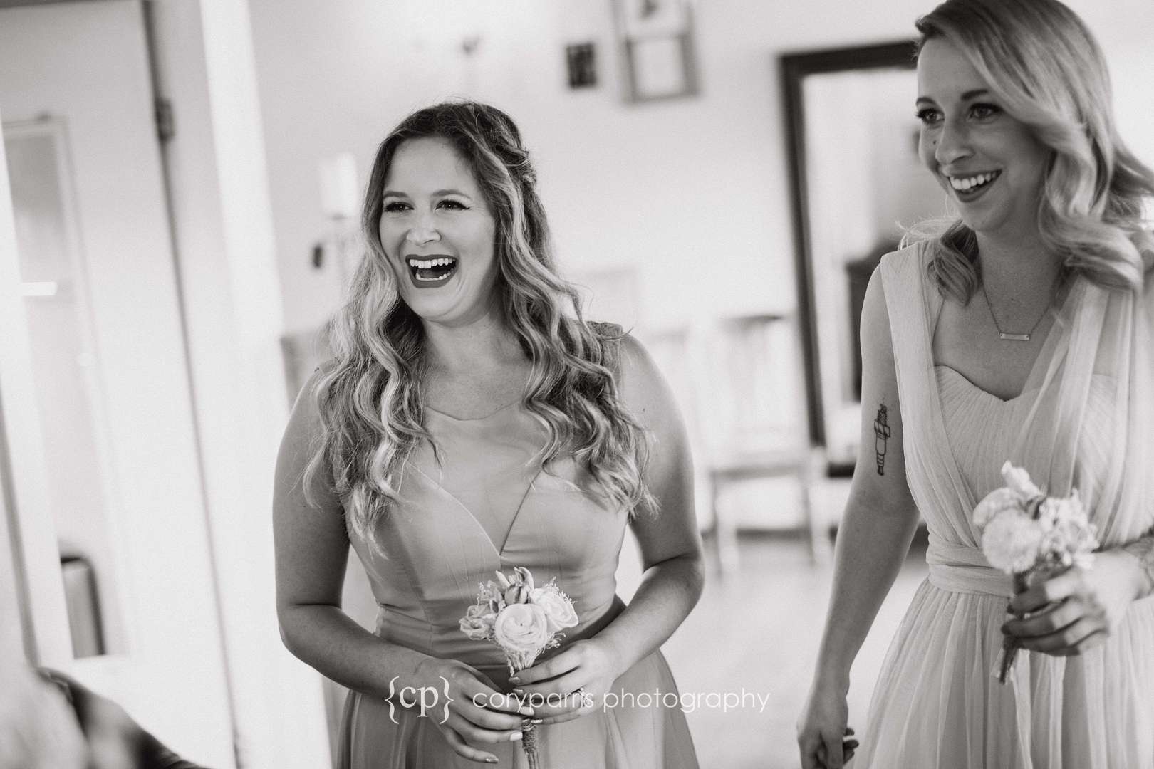Bridesmaids laughing in at DeLille Cellars Chateau