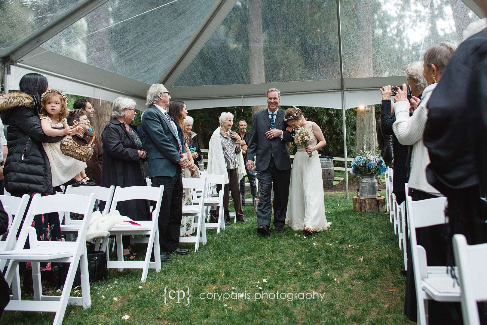 I love this image of Sonya putting her head on her dad's shoulder as they walk down the aisle before the wedding.