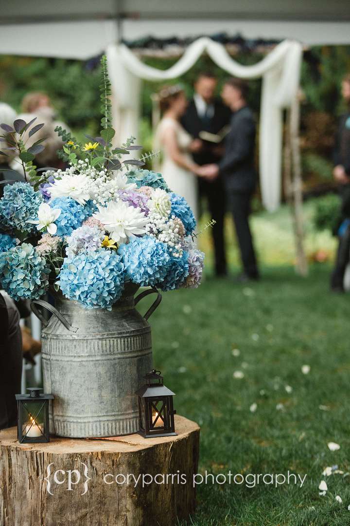 Tin milk jug and Hydrangeas wedding decor