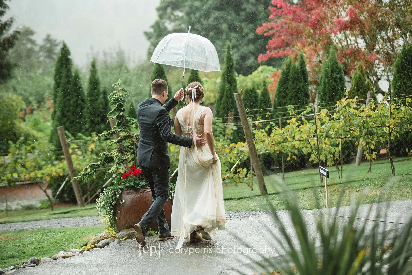Walking together in the rain after getting married.
