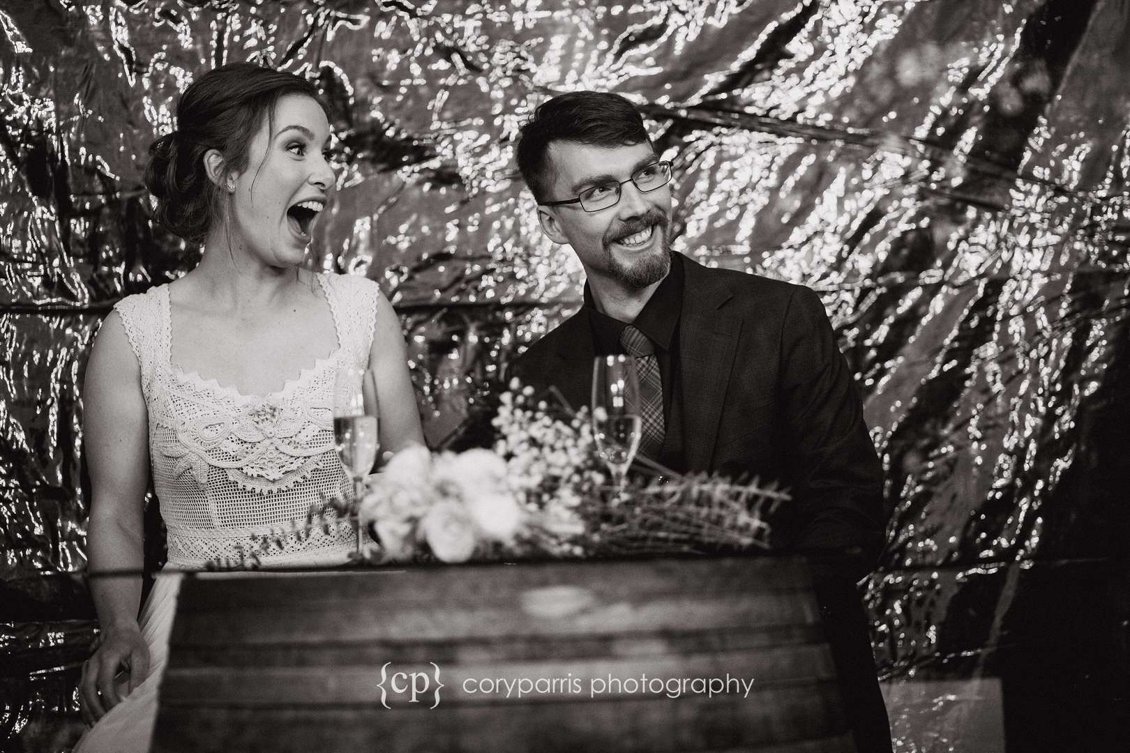 Bride and groom during toasts at DeLille Cellars Chateau