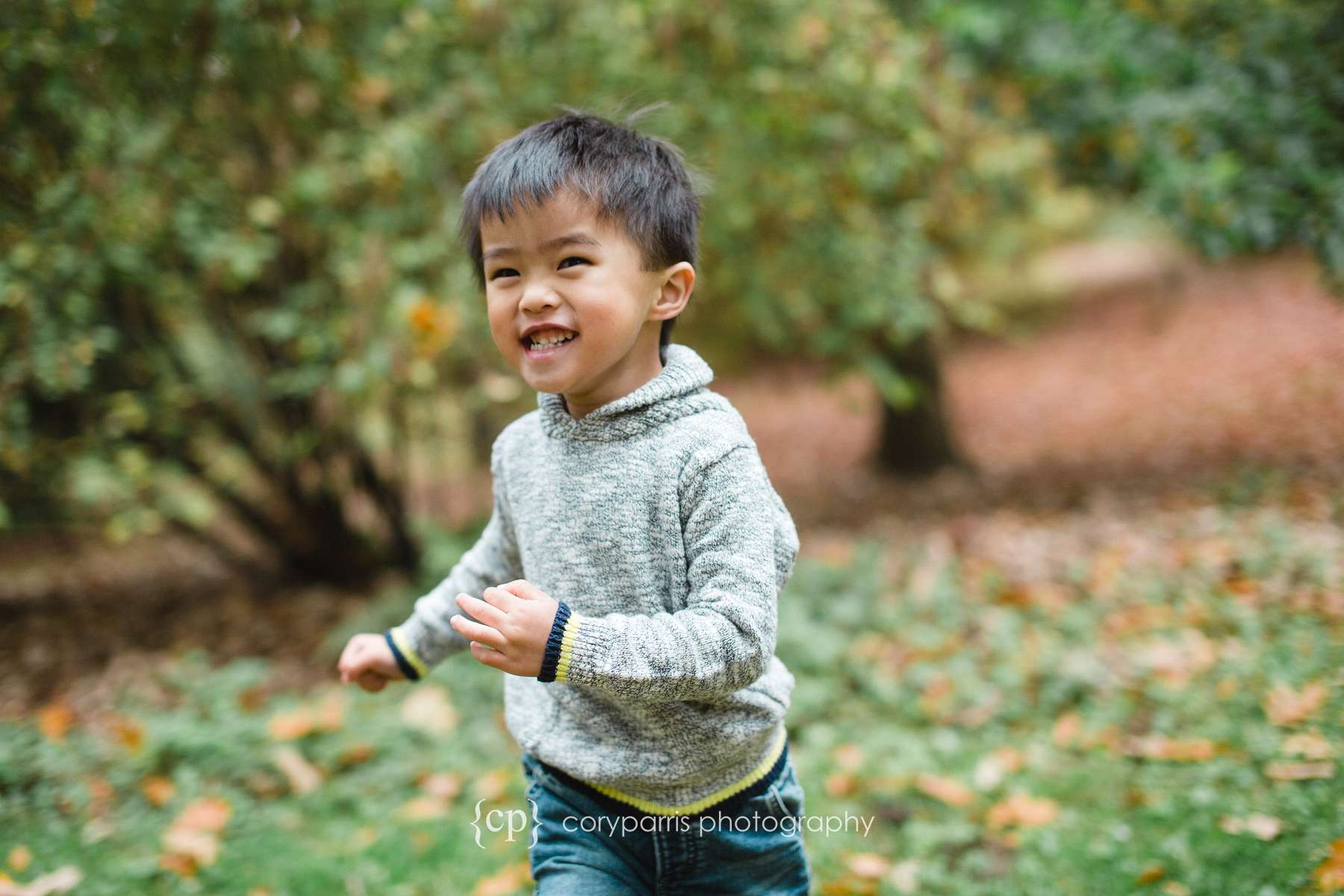 Boy running at park Seattle portraits