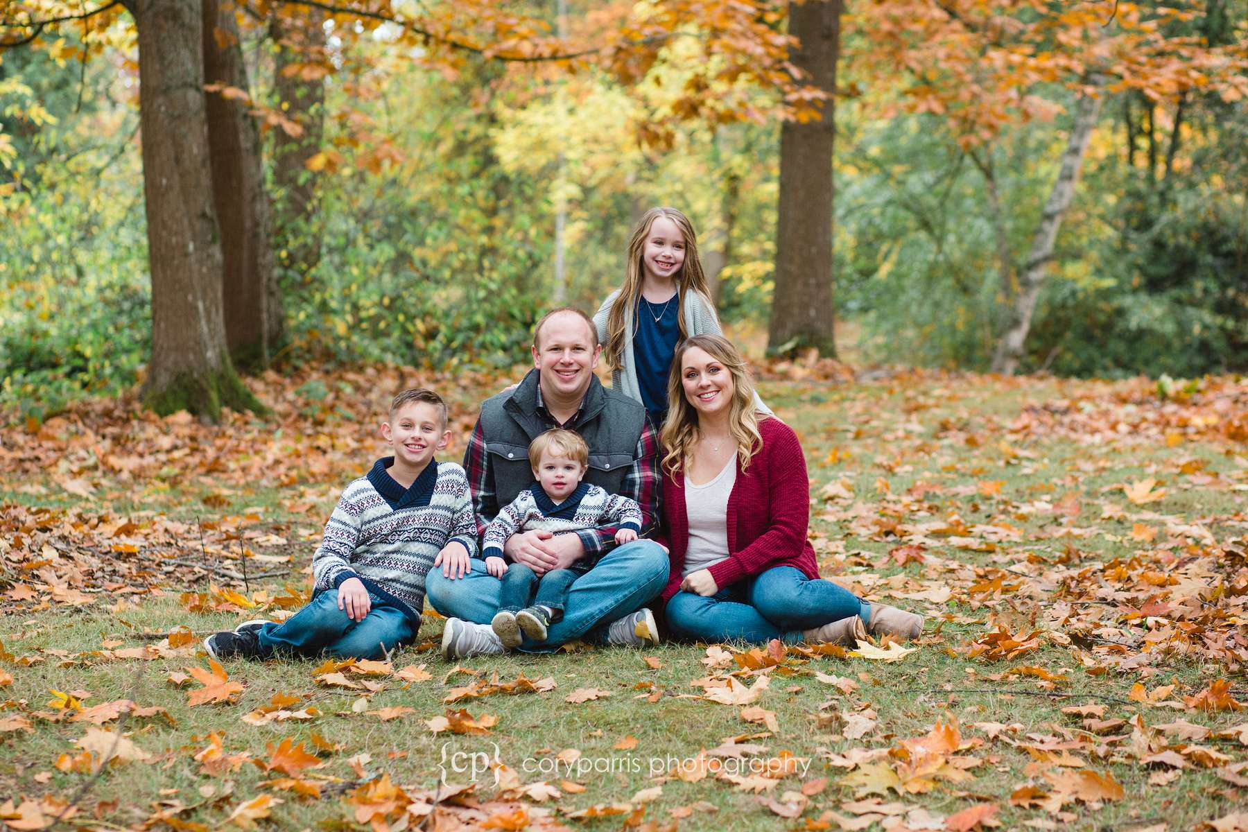 Seattle family portraits at Washington Park Arboretum in fall leaves