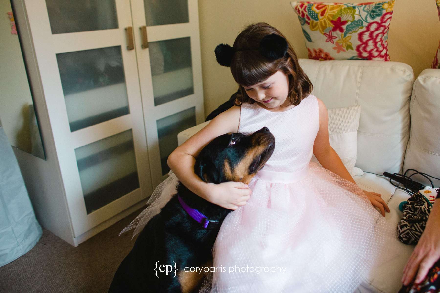  Flower girl and the puppy! I love the way they are looking at each other. So cute. 