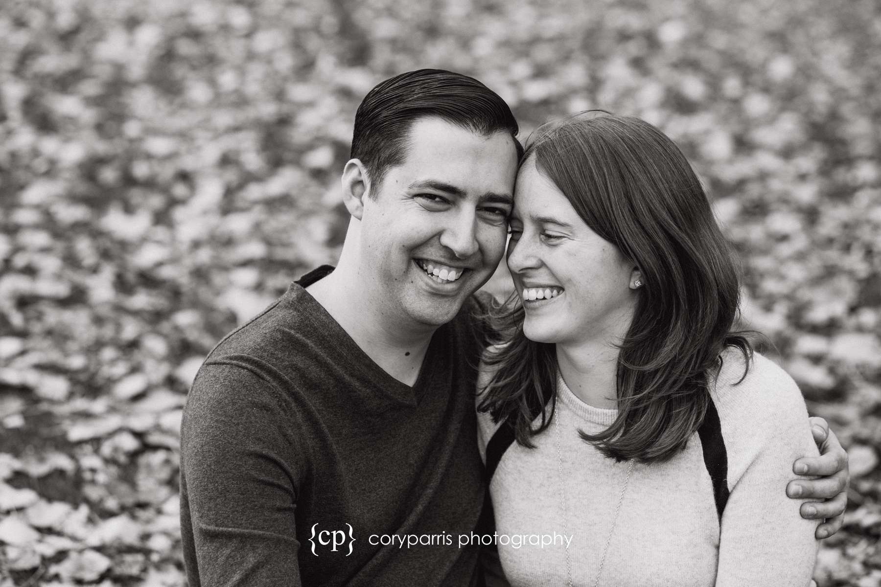 couple laughing during their engagement portraits