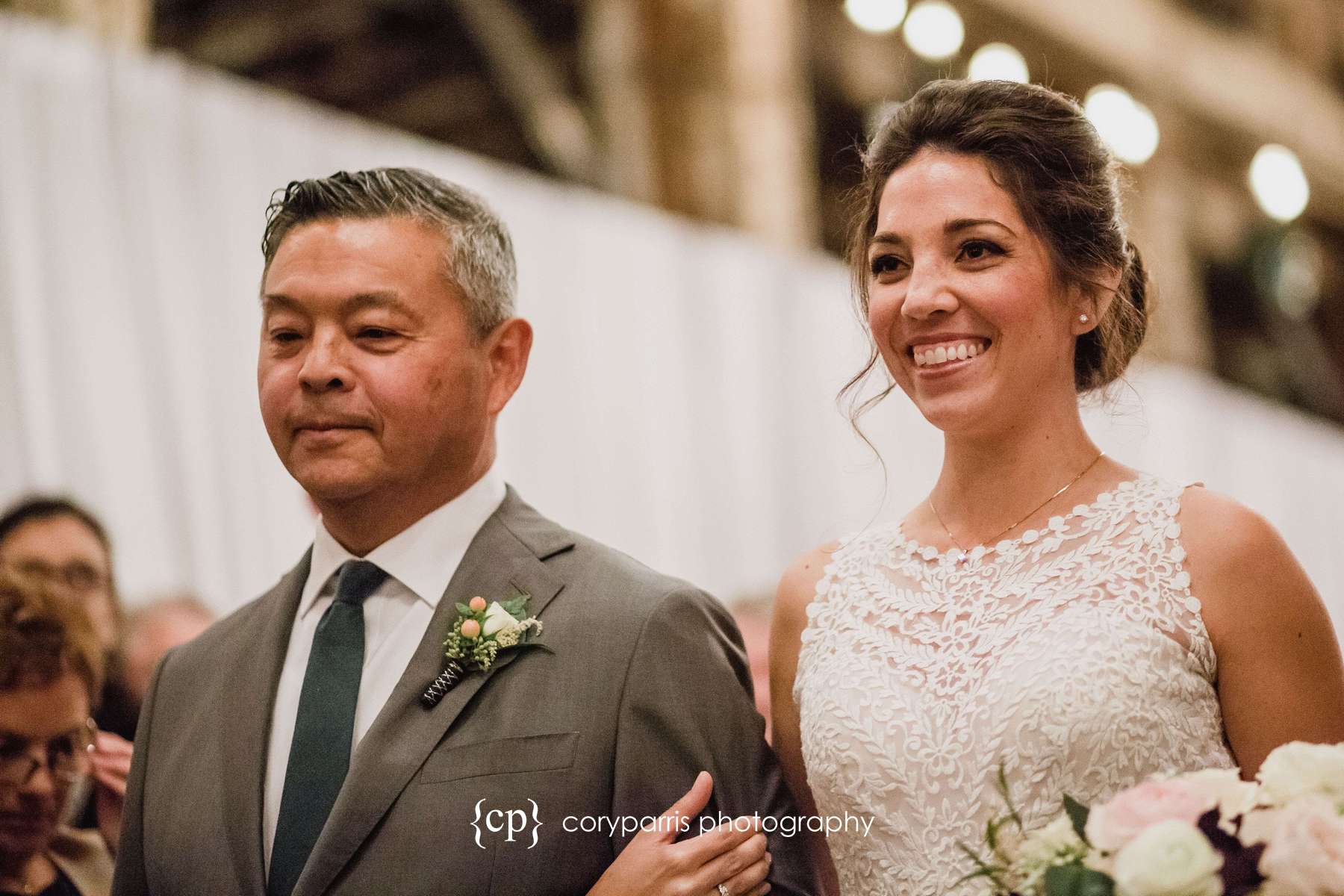 Bride walking down the aisle with her dad