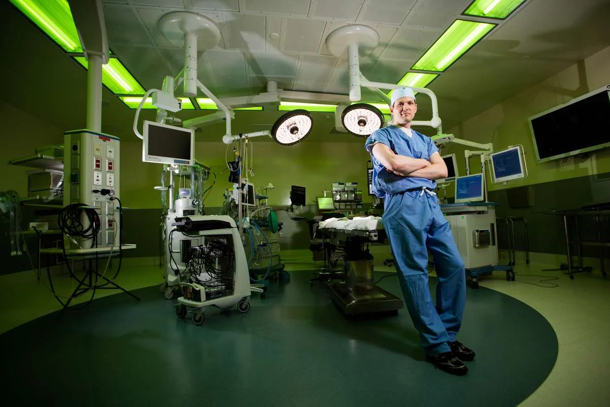 Portrait of a surgeon in an operating room.