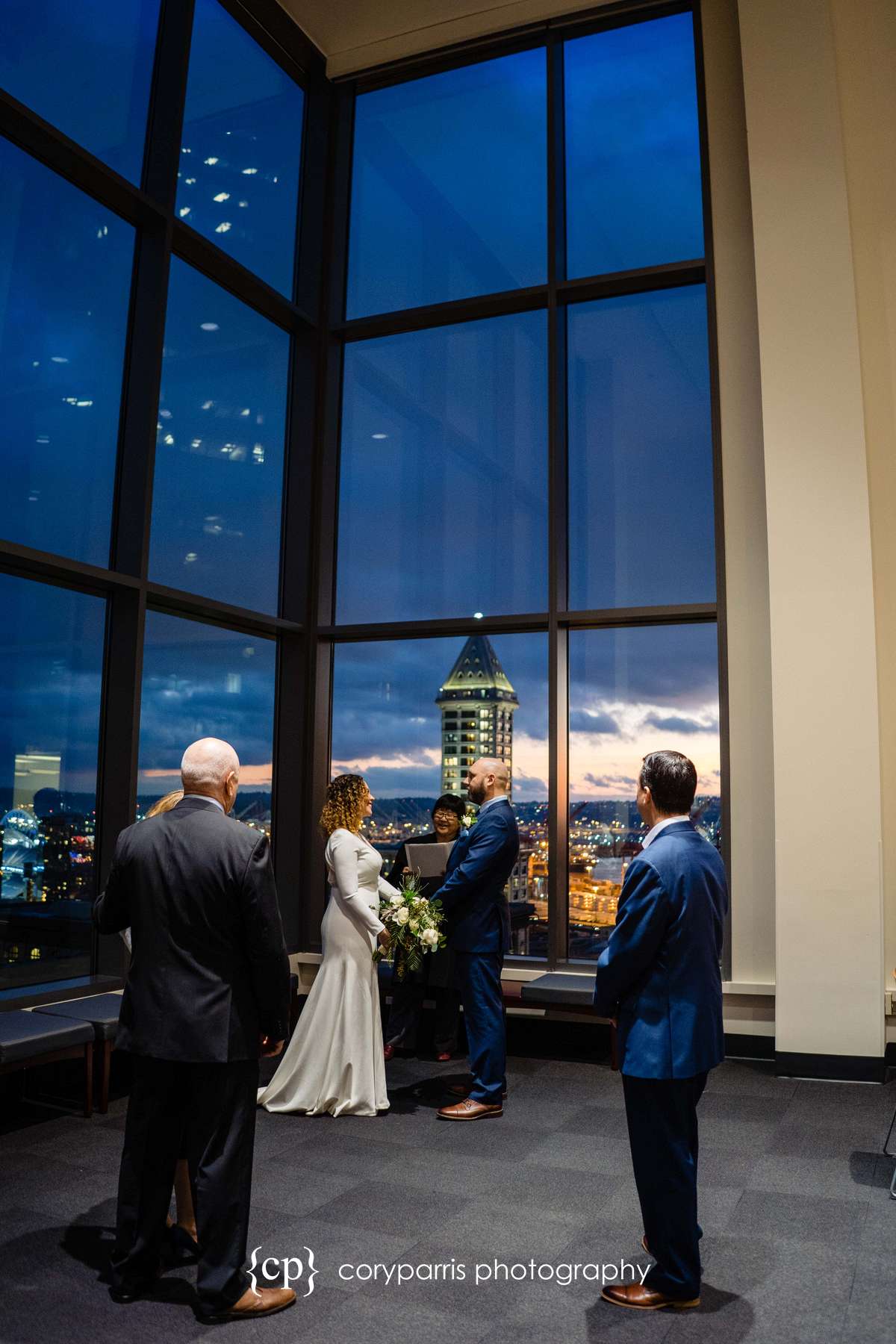  What a cool place to get married with the view of Seattle behind the couple. 