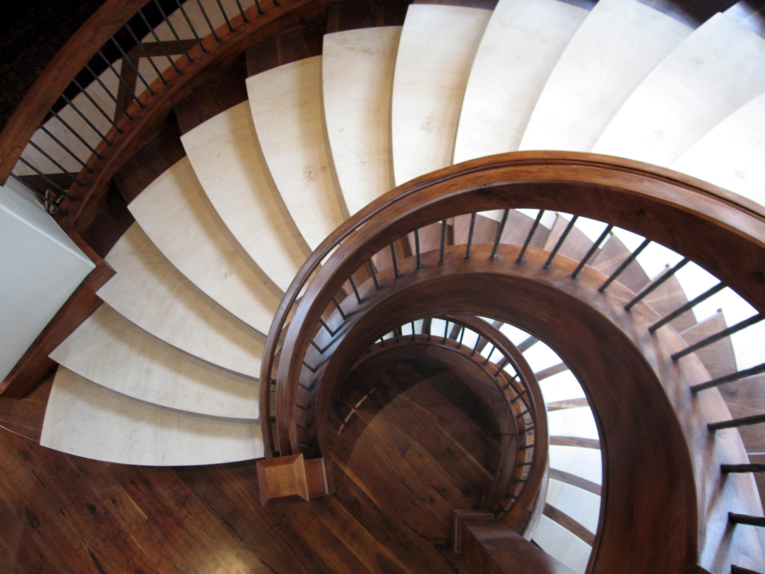 Custom Wood Staircase with Wrought Iron Balusters.jpg