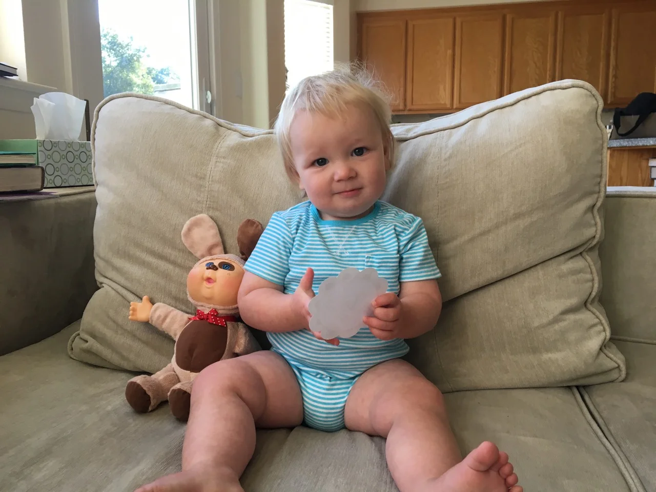 Playing with his sticker