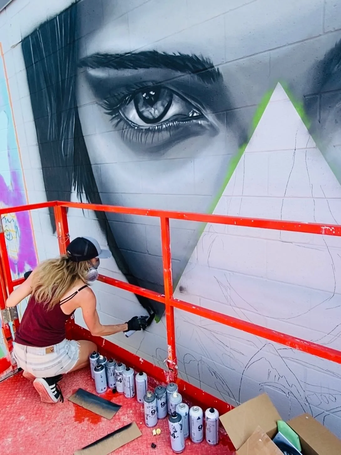 A highlight of summer was painting at @urbanartbloom in Sun Prairie, WI. It was an unforgettable experience. 💜 

@visitsunprairie @downtown_sunprairie #audifax #audifaxart #mural #muralist #streetart #sprayart #madisonmuralist #streetartist #madison