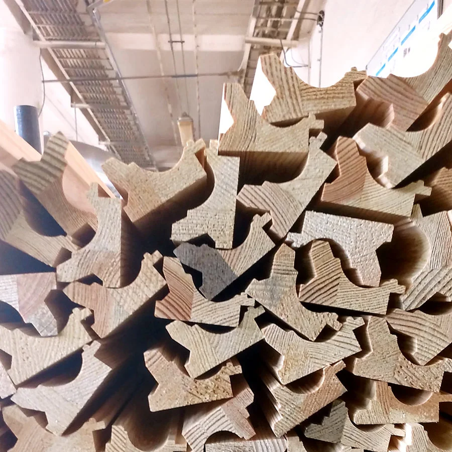 These mouldings have been carved and are ready to be hand finished in a variety of colors and materials. You can see the variation in the wood and how they've been fused together. It's a truly amazing process!