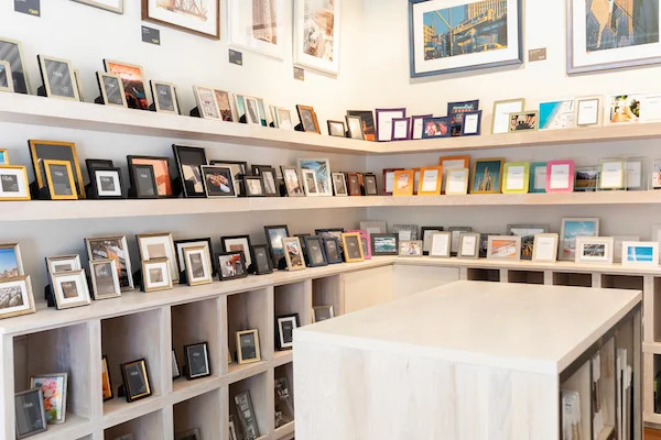 There’s no shortage of photo frames either - from muted metallics to bright acrylics to our own unique line of ready-made gallery frames .