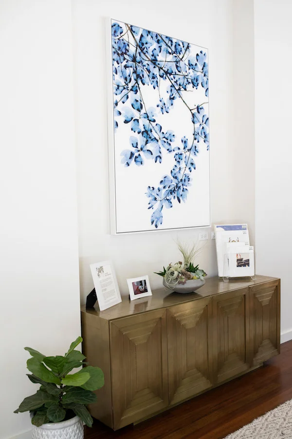 A curated selection of art includes some of our local favorites, as well as a gallery wall installation and works from sister company, Chicago Art Source.