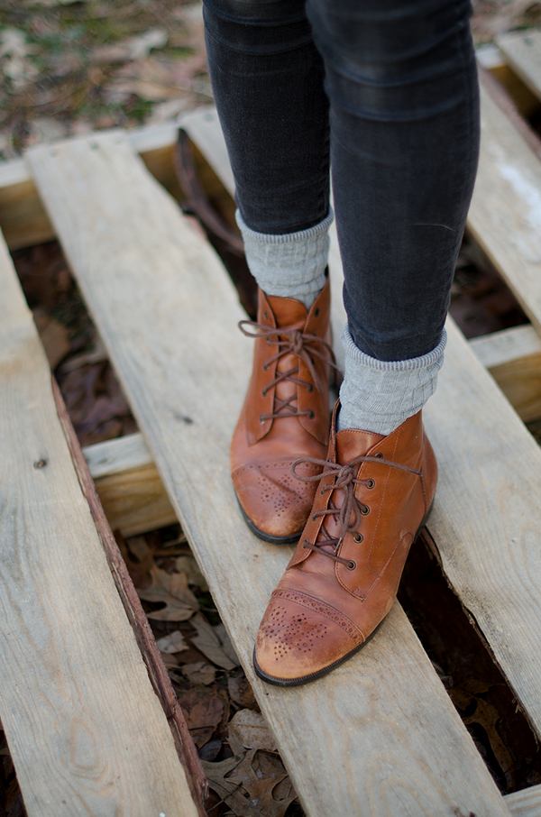 Brown boots with socks for fall