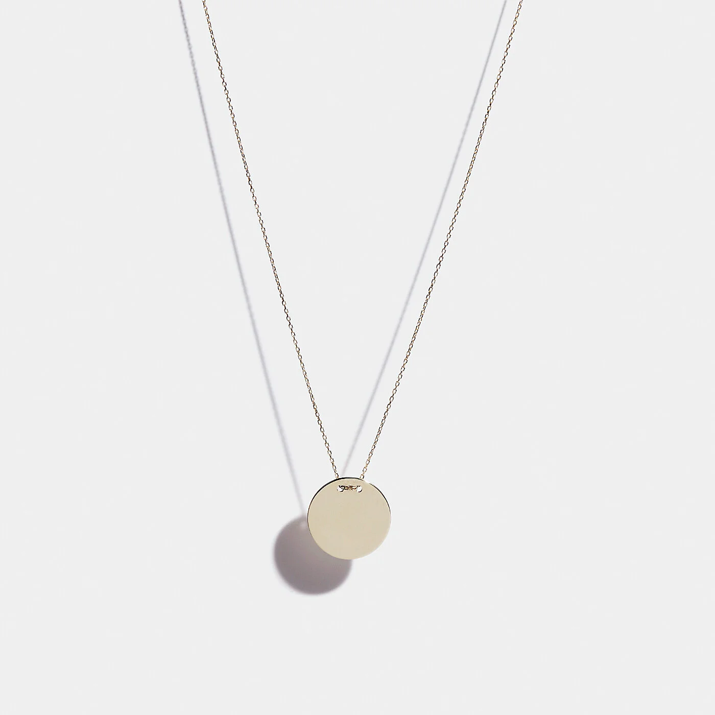 DISC NECKLACE NO. II GOLD.jpg