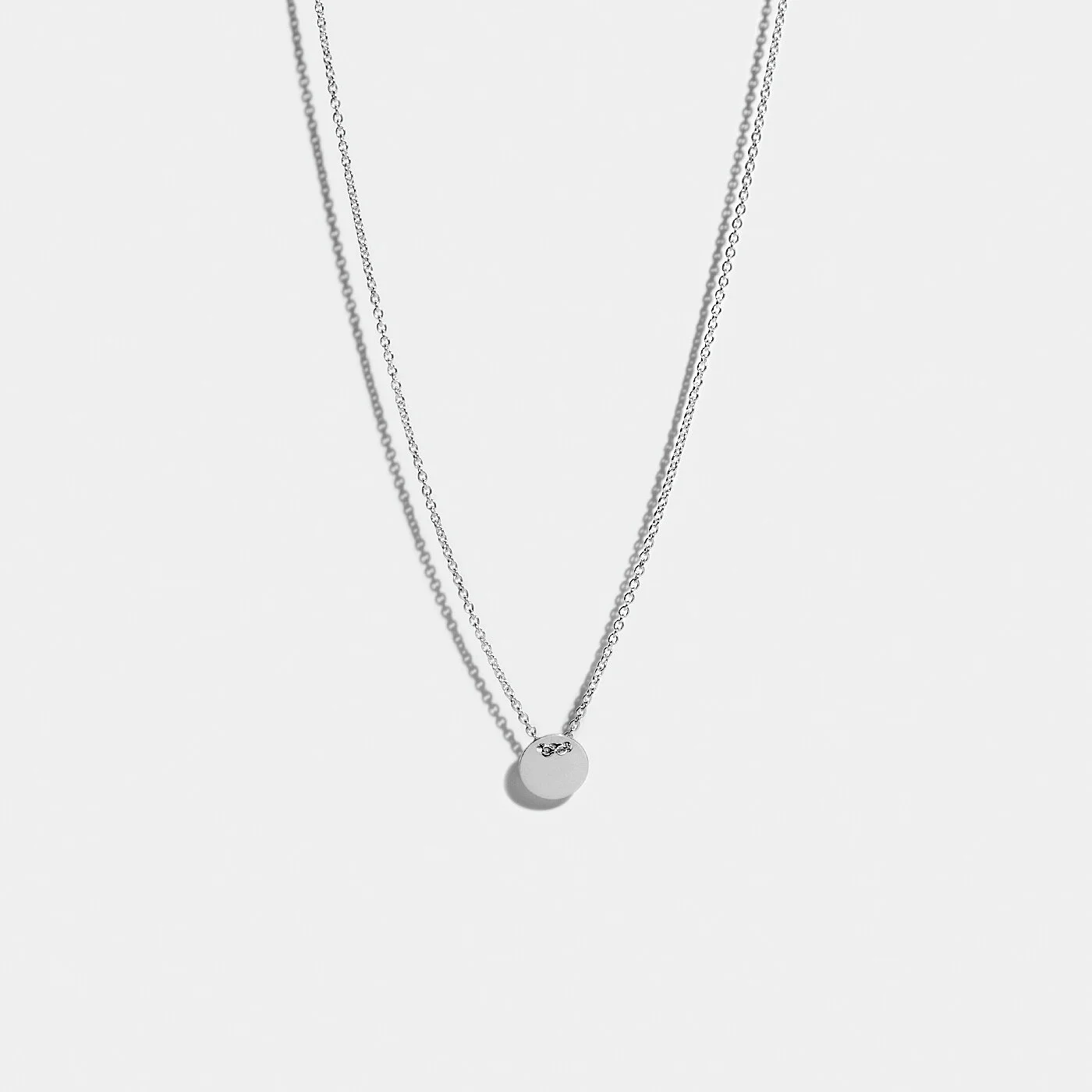 SMALL DISC NECKLACE SILVER.jpg