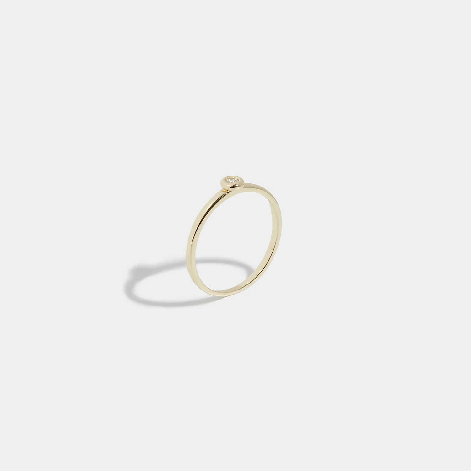 Surrounded diamond ring