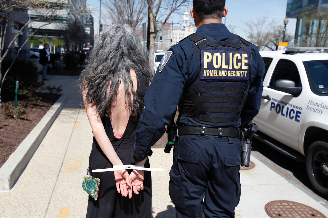  Bethany Yarrow is arrested outside of the Federal Energy Regulatory Commission building. 