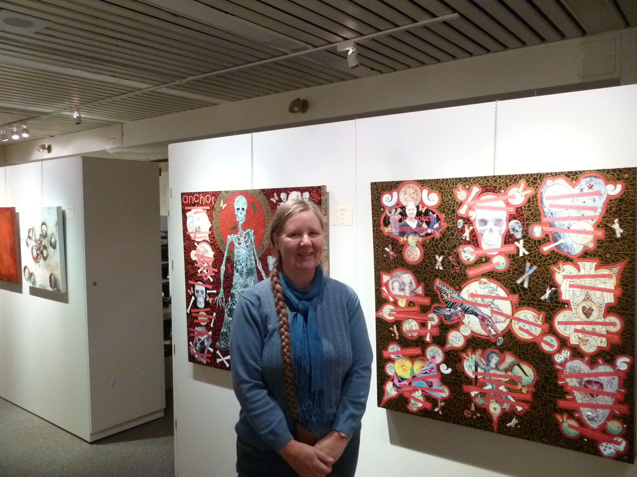 Jo, in front of "anchor", and "the unspoken language". Acrylic on canvas, mixed-media collage. 