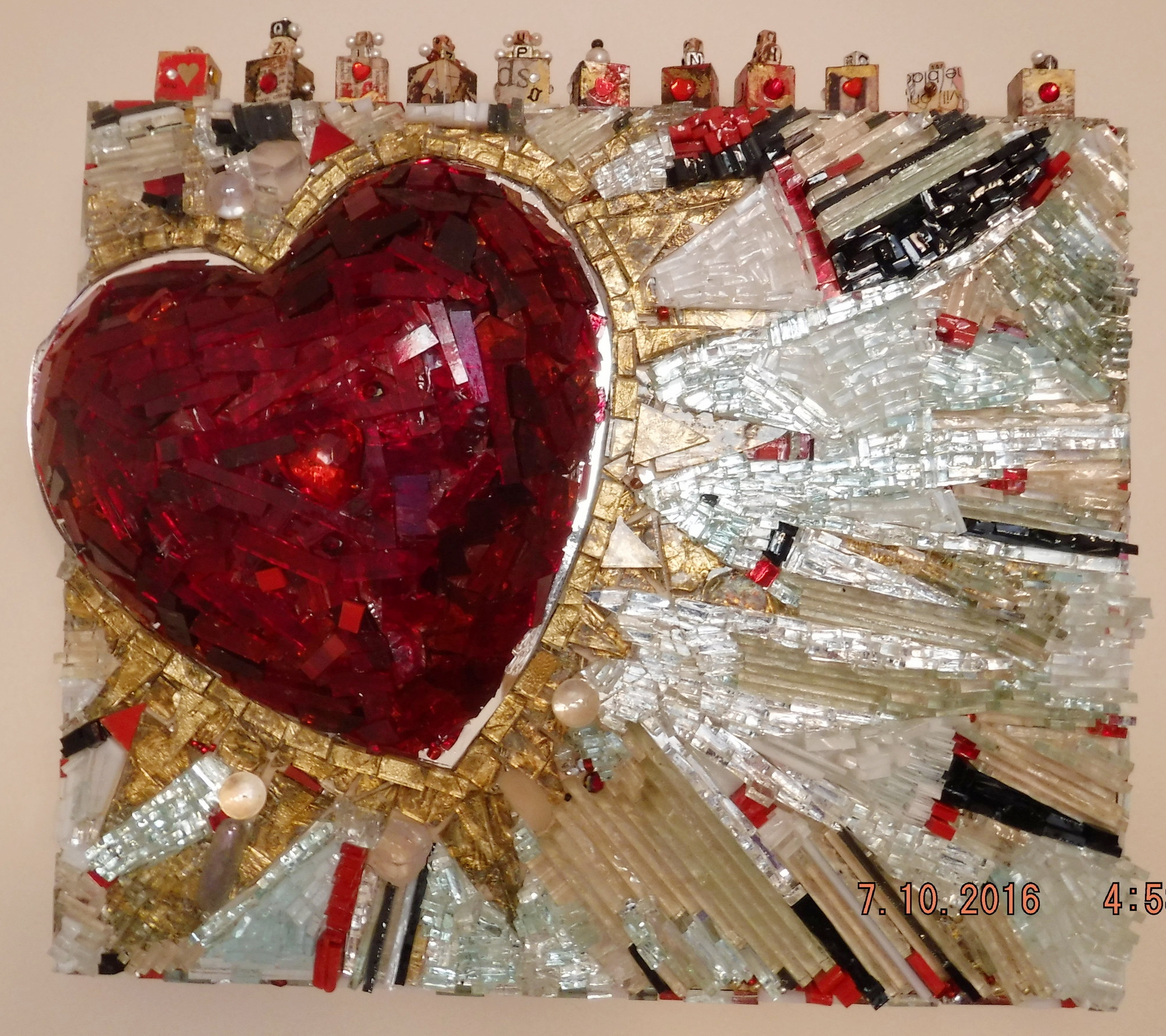 Glass mosaic - mirror, glass, gold leaf, beads, wooden blocks, collage, on wooden shadow box.