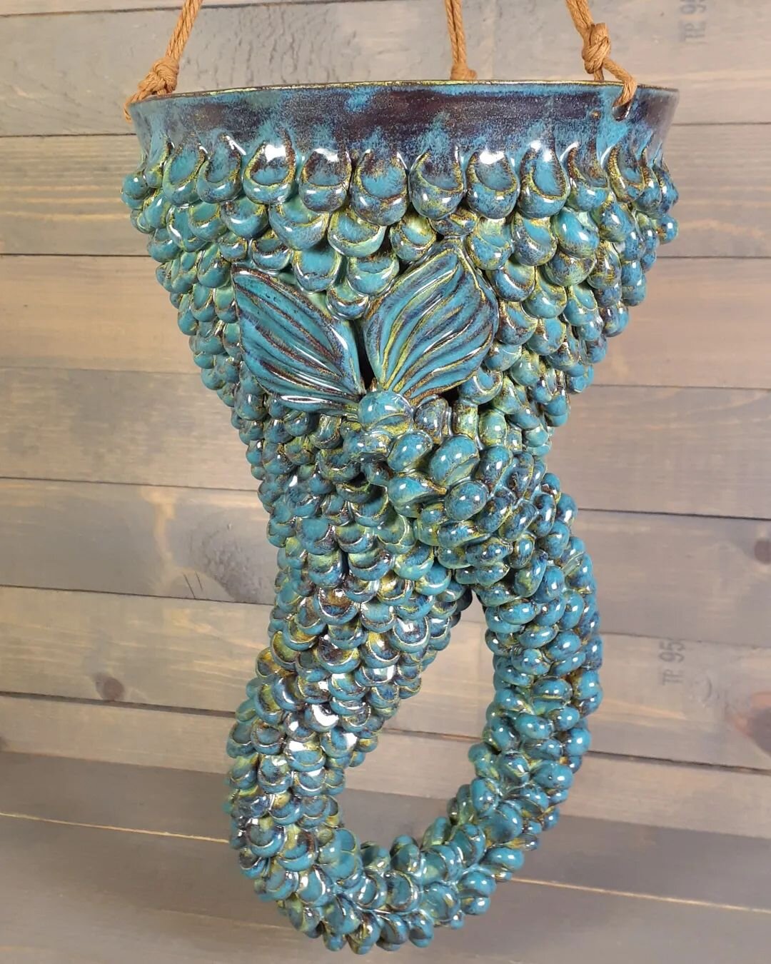 One of my biggest 🧜&zwj;♀️ pots! I love how twisty her tail is! 

#hangingplanter #jmnpottery #mermaid #handmadeceramics