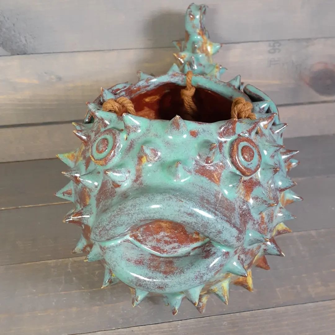 Puffer Fish, straight from the kiln 🔥 ❤ 🔥 
I love making these guys, I'm working on some new 🐟 buddies to add to the collection 🙂

#jmnpottery #hangingpots #succulentpots #handmadeceramics #fishsculpture #pufferfish 
#spikedpottery